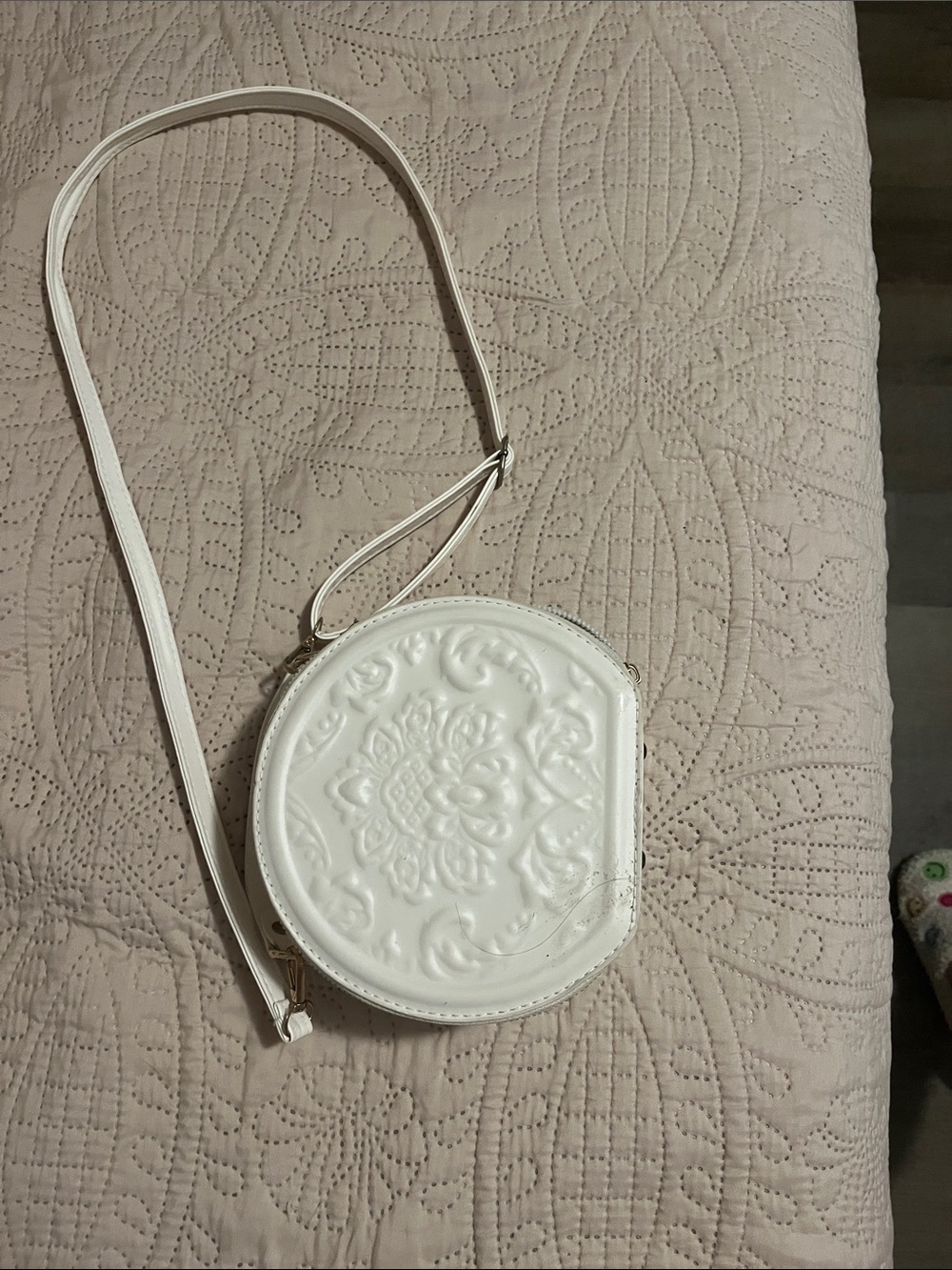 White Embossed Round Crossbody Bag